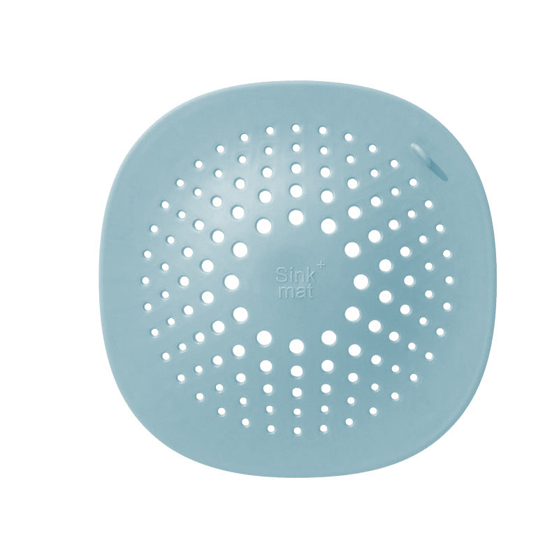 kitchen sink floor drain in lake blue with a perforated design for effective drainage