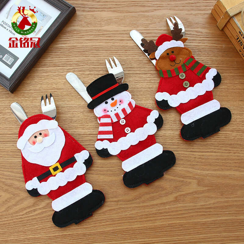 Christmas Knife And Fork Set Christmas Product Knife And Fork Bag featuring Santa, snowman, and reindeer designs.