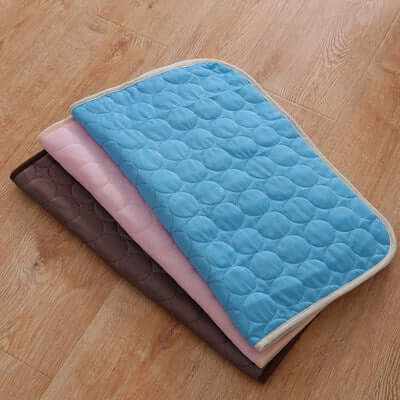 summer cooling mats for pets in blue, pink, and brown colors ideal for dogs and cats
