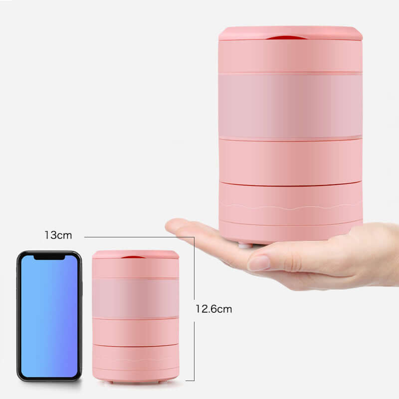 Mini Portable Blender for Smoothies next to a smartphone to showcase its compact design.