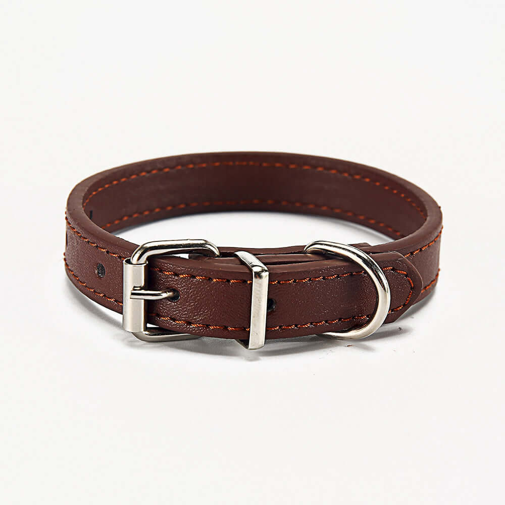Pet collar made of durable PU material, perfect for dogs, showcasing its sleek design and sturdy buckle.