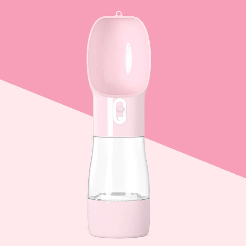 Portable pet water dispenser for travel in pink color, designed for pet owners on the go.