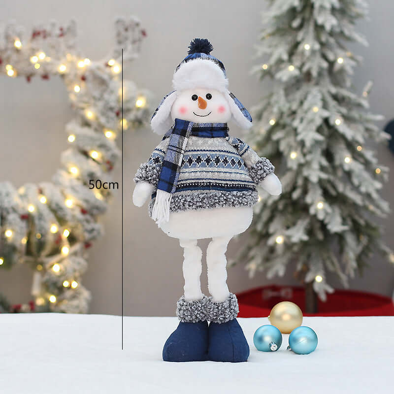 Christmas New Product Blue Fabric Expandable Snowman Doll Adornment Decoration displayed in a festive setting.