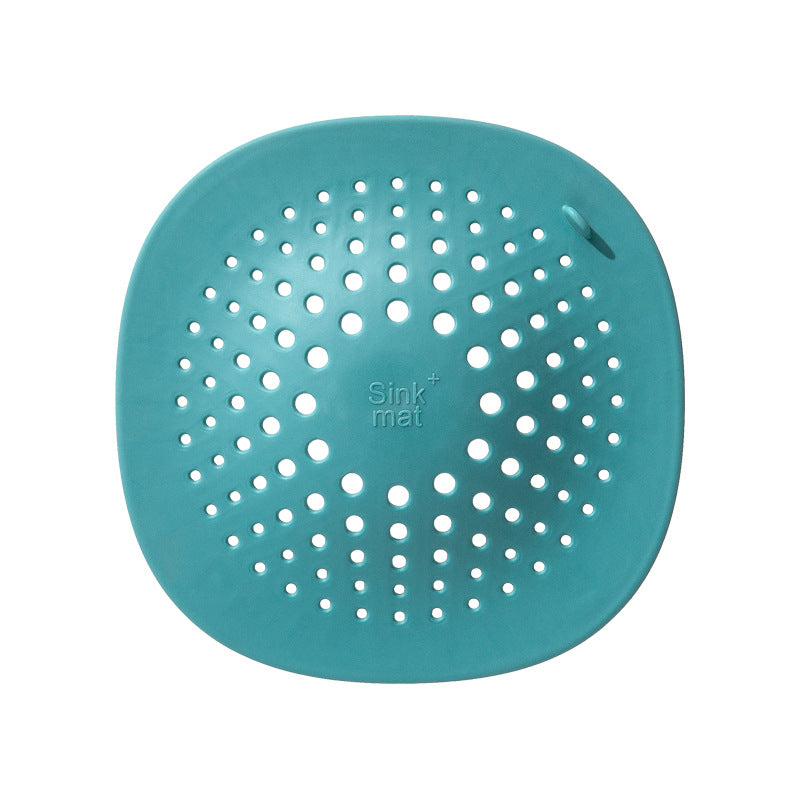 kitchen sink floor drain made of high-quality TPR, featuring a turquoise color and a perforated design for drainage.