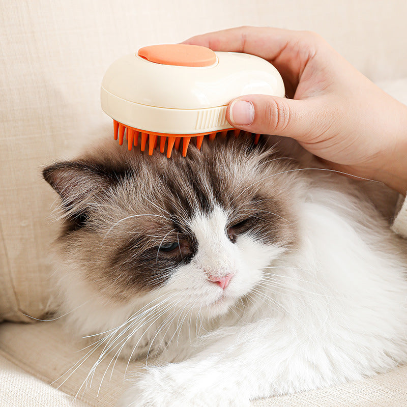 Electric Cat & Dog Steam Brush being used on a fluffy cat for grooming and detangling fur.