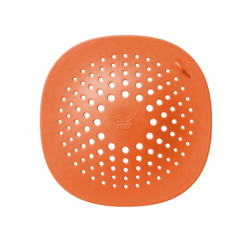 Orange kitchen sink floor drain made of high quality TPR, perfect for effective drainage and sink protection.